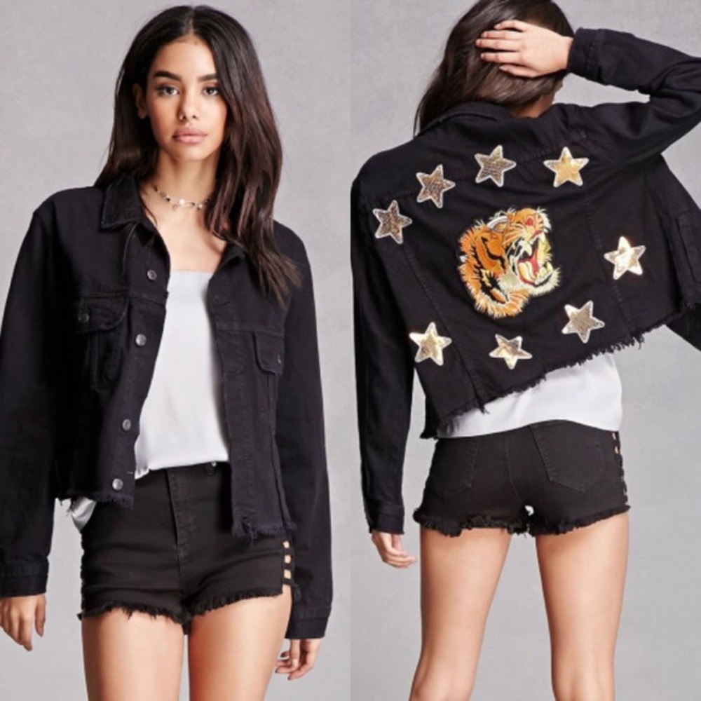 Black frayed jean jacket with embroidered tiger